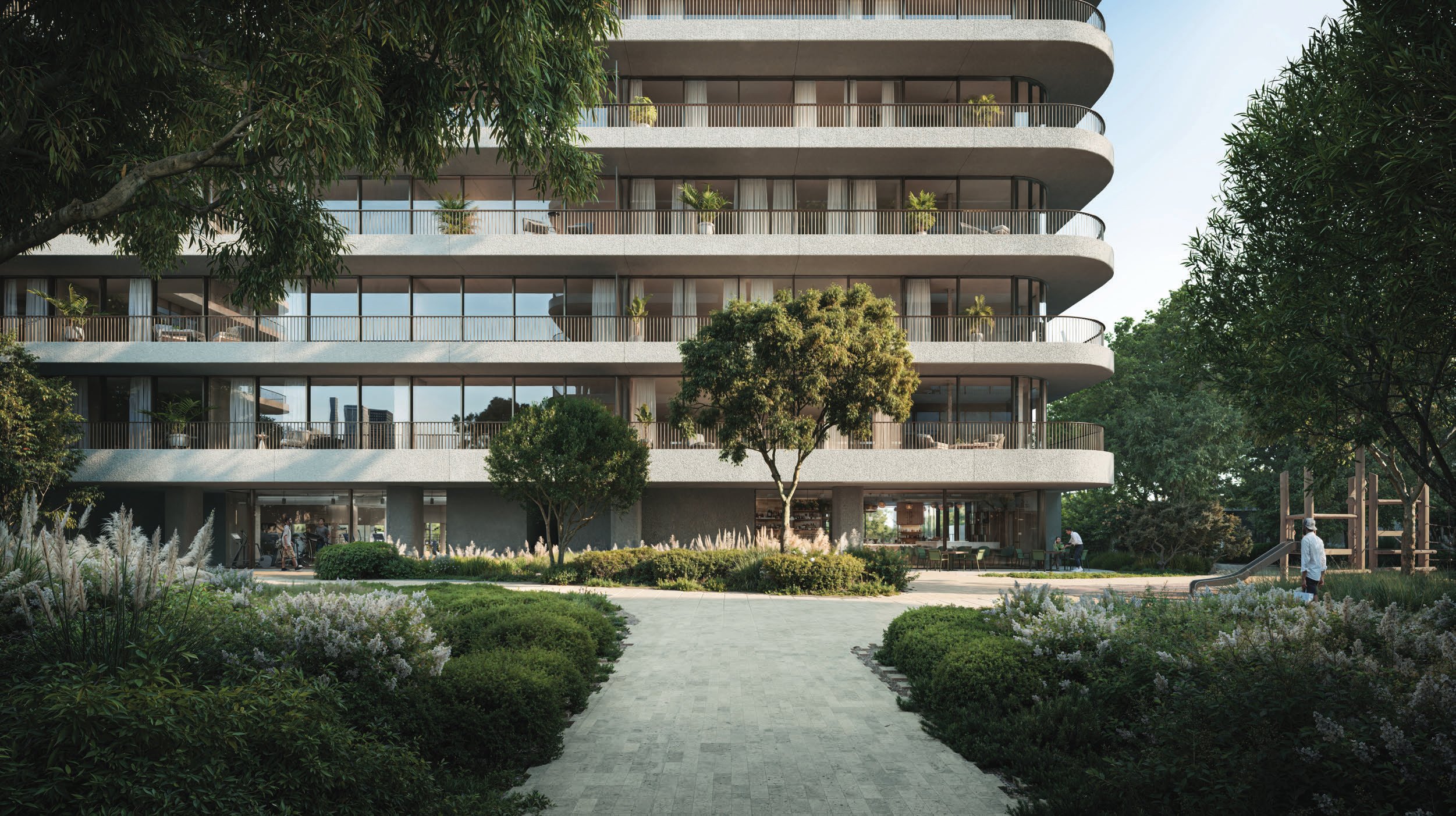 Curved balconies and glass facade above landscaped garden paths
