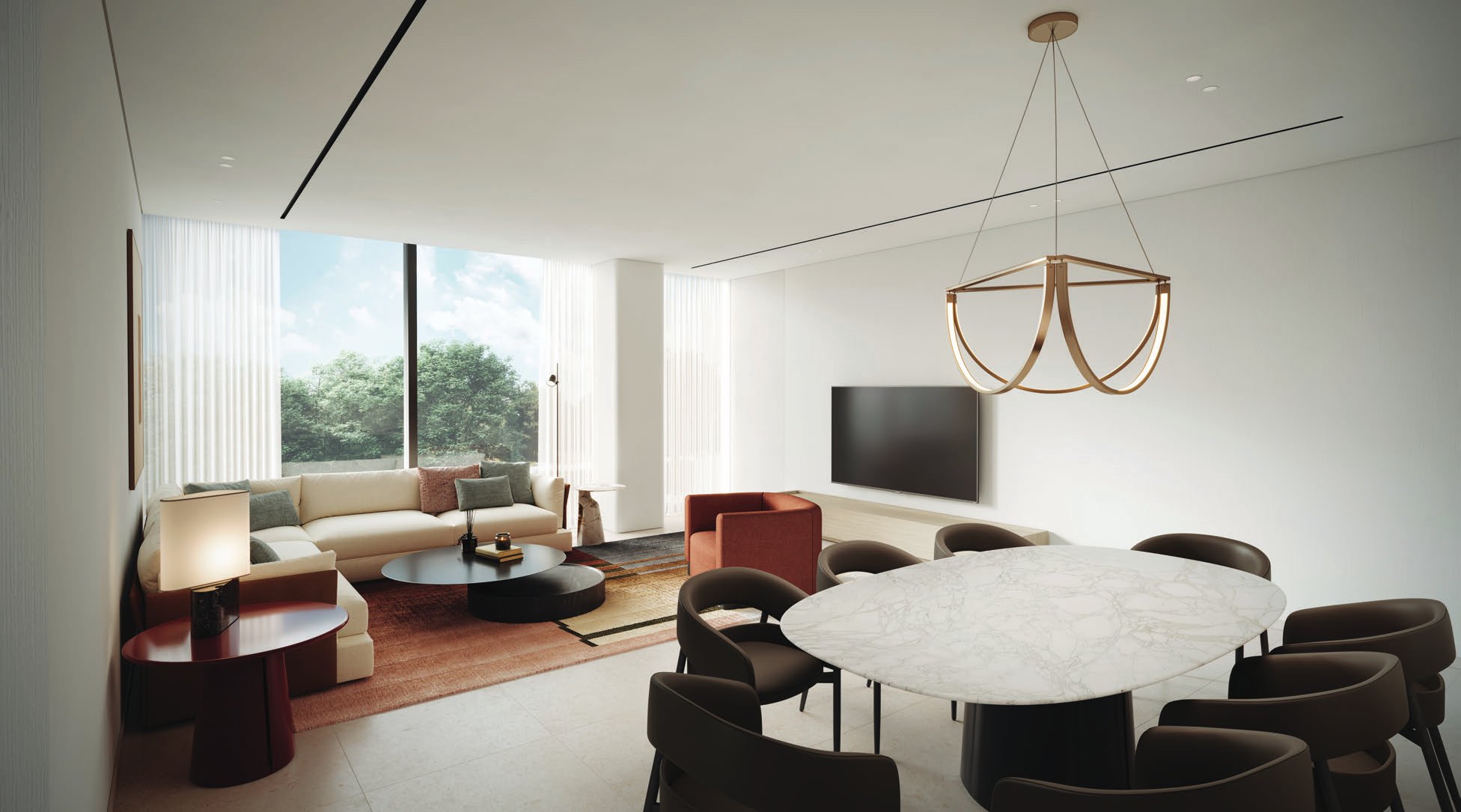 Living and dining room with tall windows looking onto trees