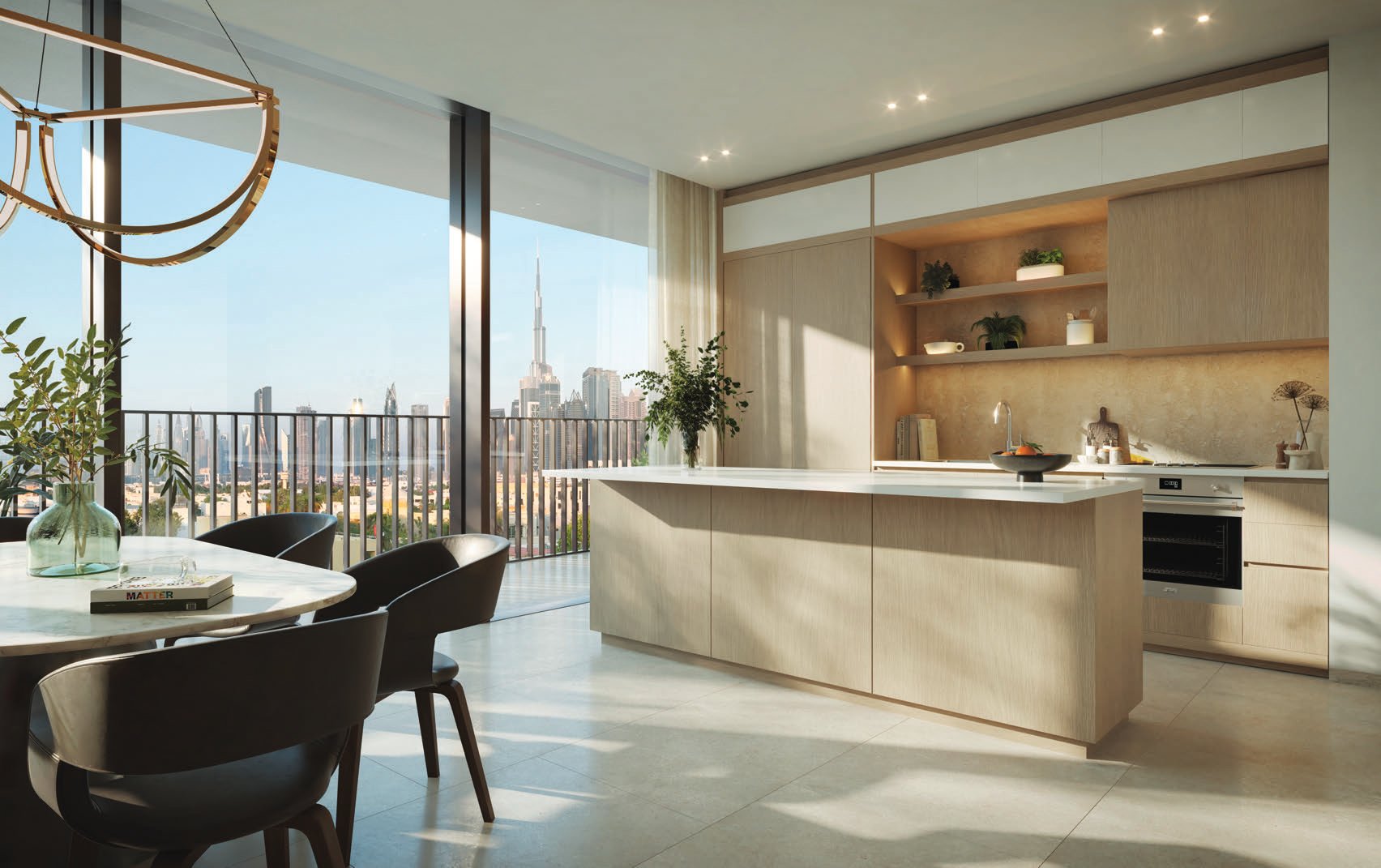 Pale oak kitchen with island and floor-to-ceiling windows to the skyline