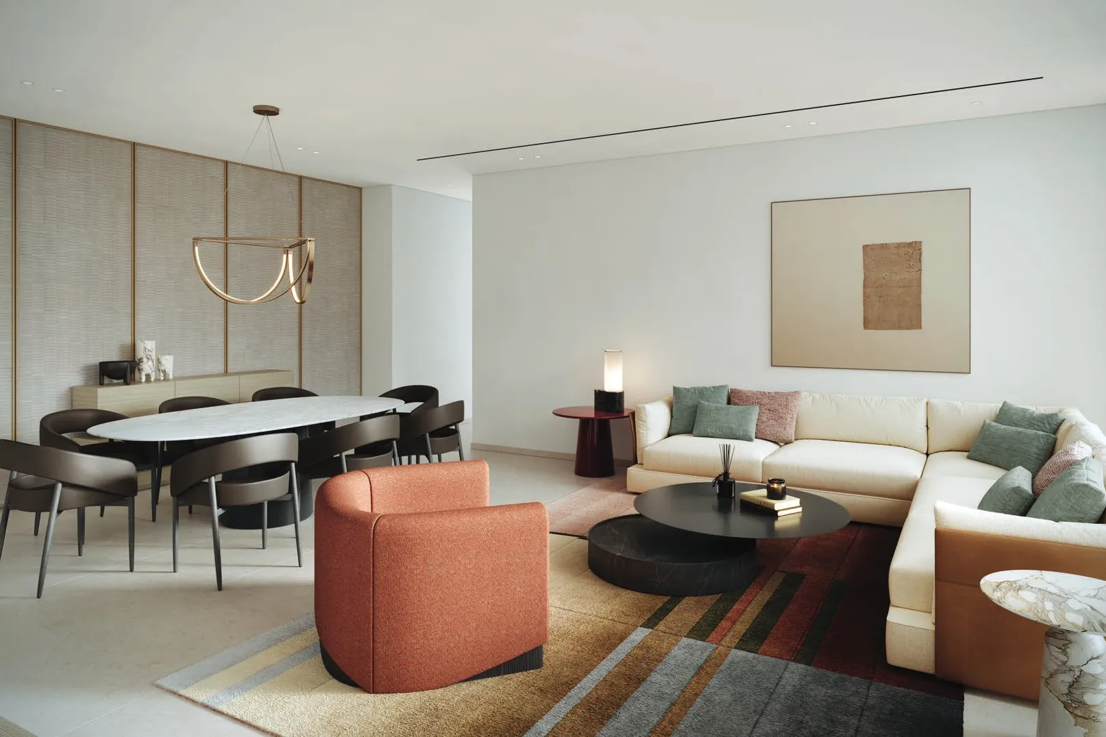 Open living and dining space with marble table and textured wall panels